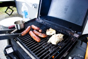 Grilling local sausauges and really local fish